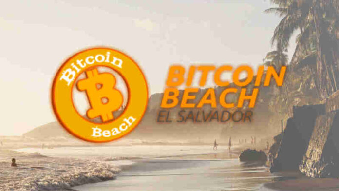 Existe un paraíso para los afinados a las criptomonedas y se llama “Bitcoin Beach” en El Salvador. Composicion grafica con el logo de la App Bitcoin Beach Wallet.